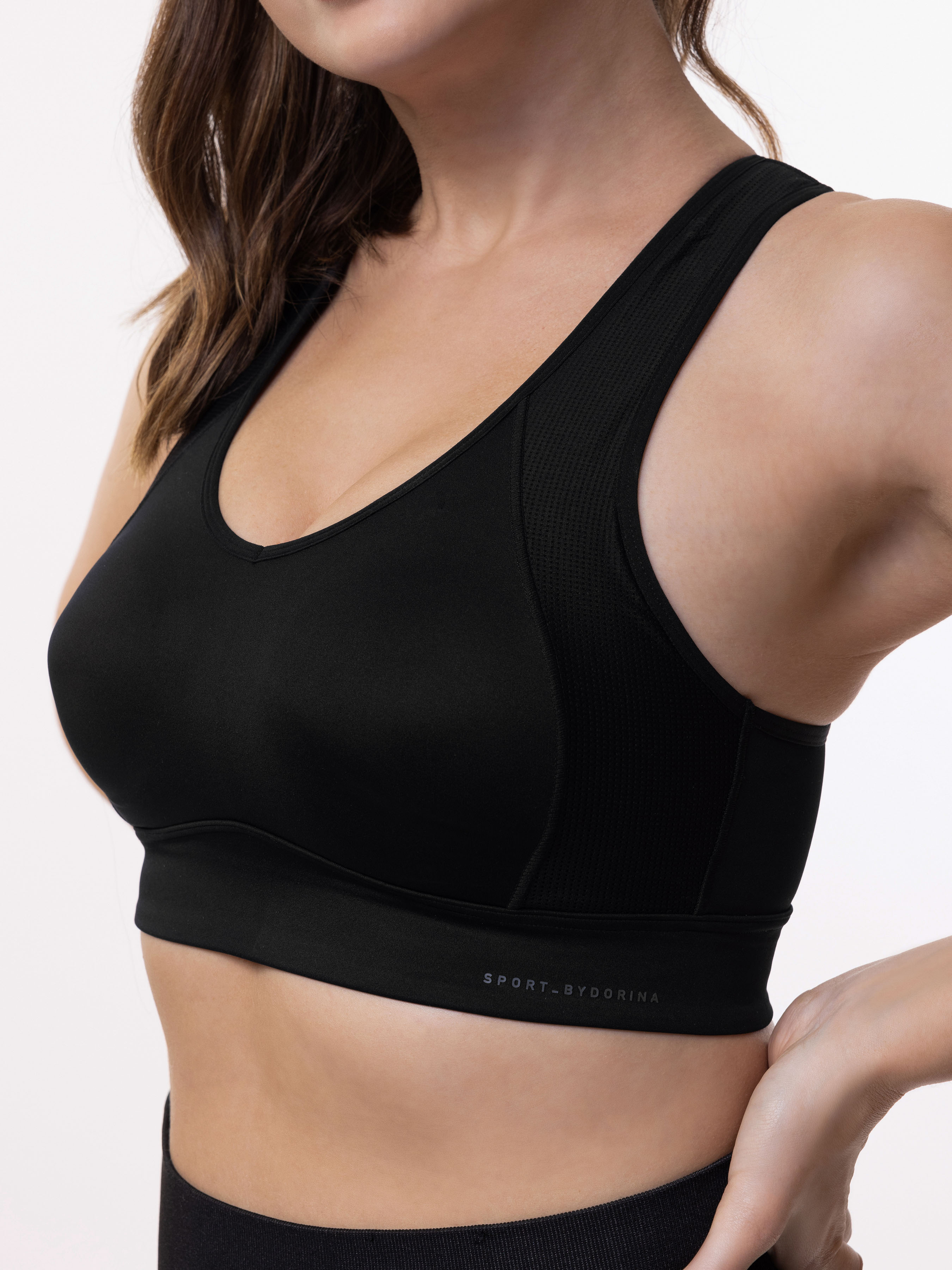 Dorina Defender micro lightly padded zip front sports bra in black